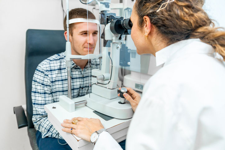 Man in an annual check up curious about LASIK alternatives.