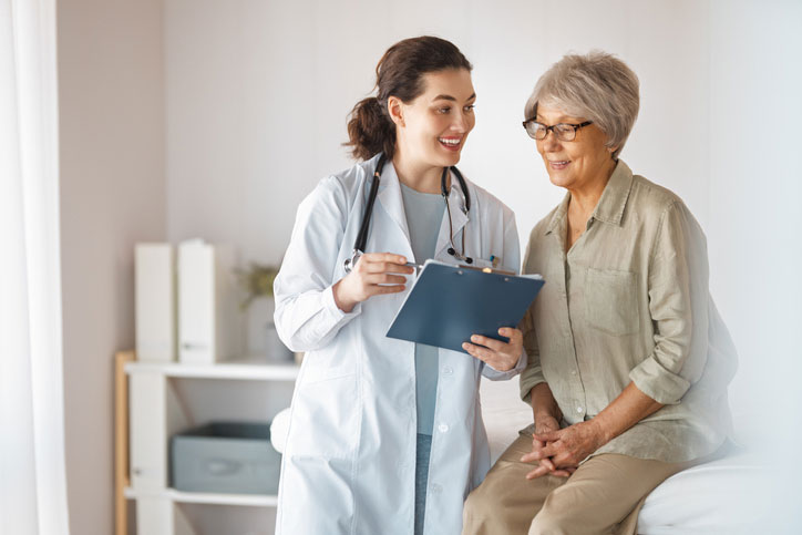 Eye Doctor discussing Retinal Vascular Occlusion care plan with patient.