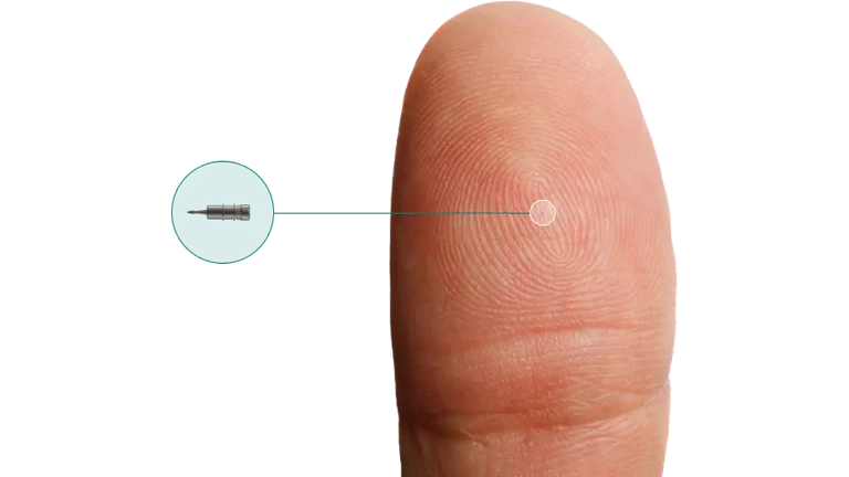 Image sample of a thumb against the iDose TR implant.