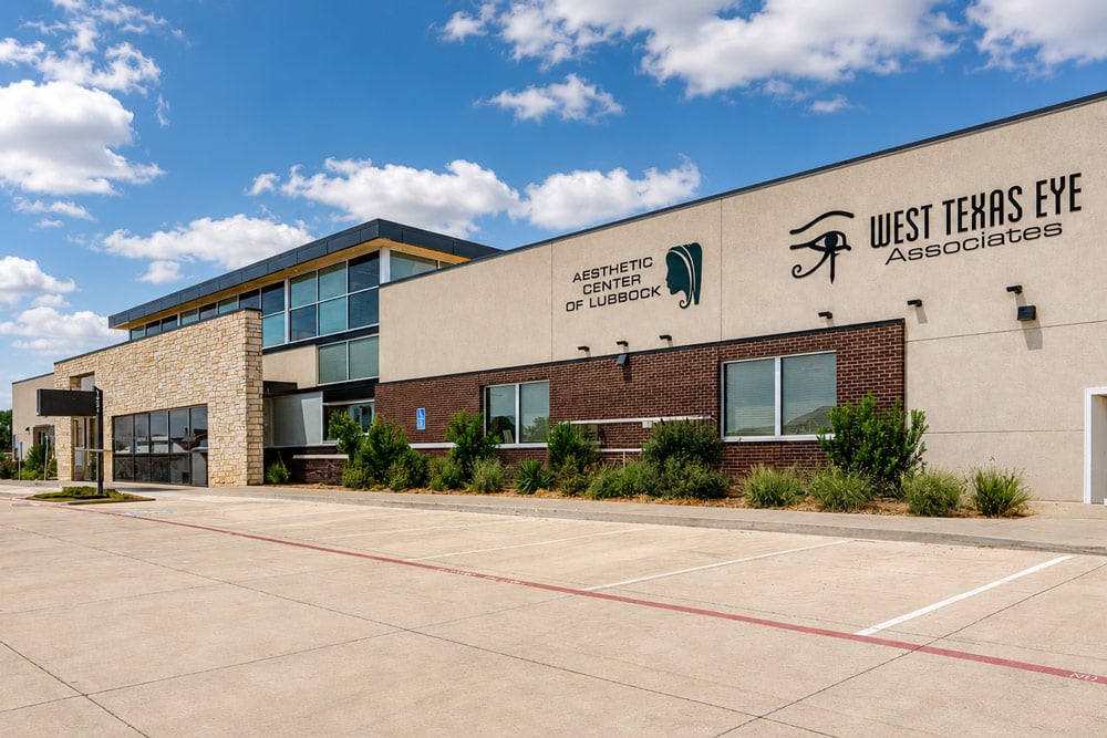 West Texas Eye Associates eye center location in Lubbock, Texas, with exterior building signage for West Texas Eye Associates and Aesthetic Center of Lubbock.
