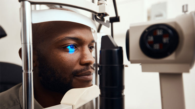 Image of an Optometrist conducting tests on a patient at West Texas Eye Associates, TX.