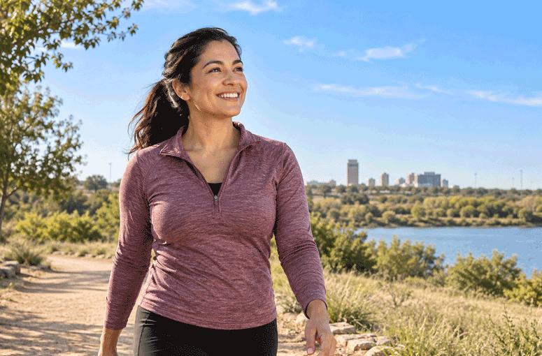 Woman enjoying clear distance vision outdoors after PRK recovery